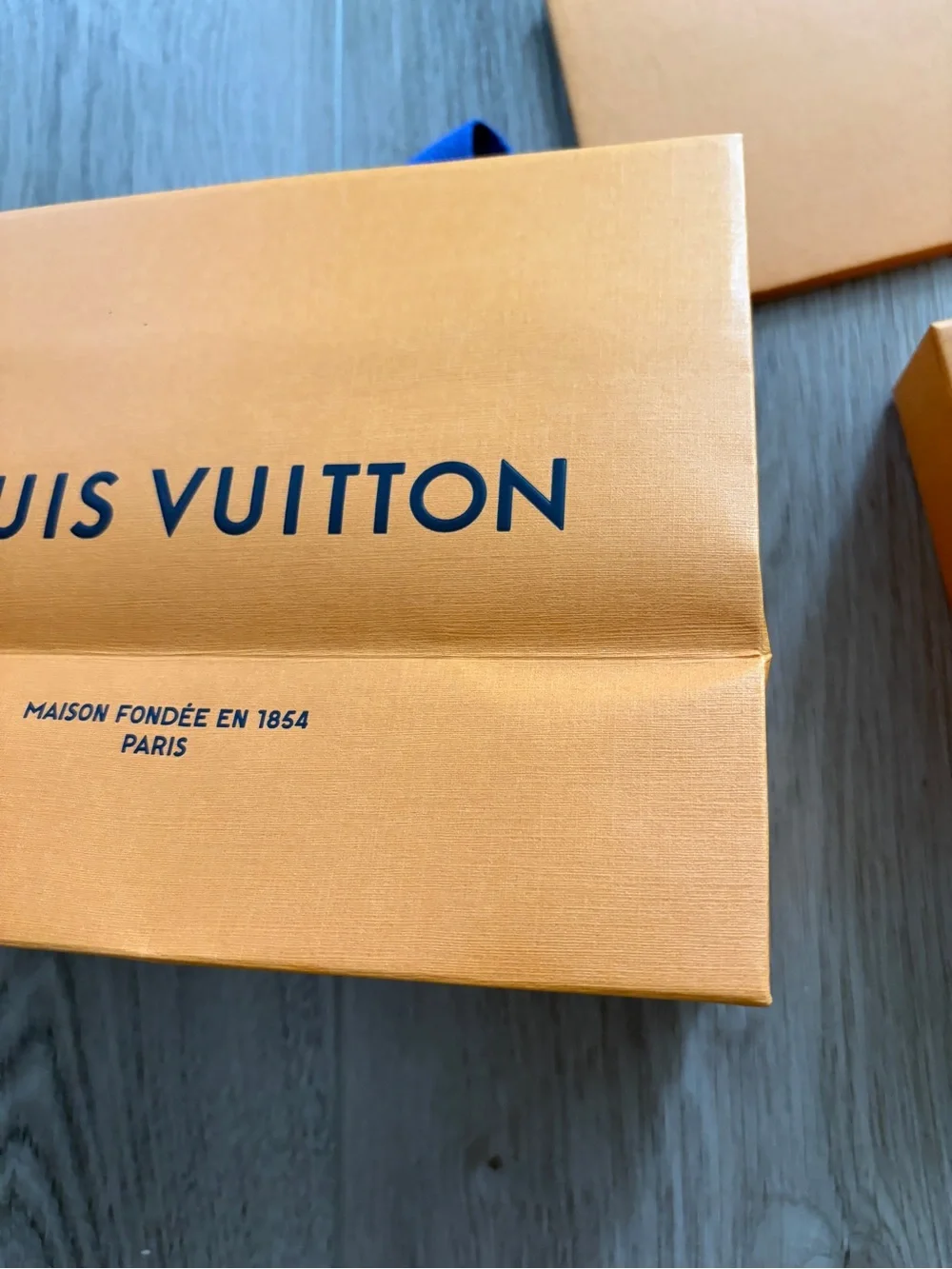 Louis Vuitton Orange Gift Set with Blue Ribbon Accents